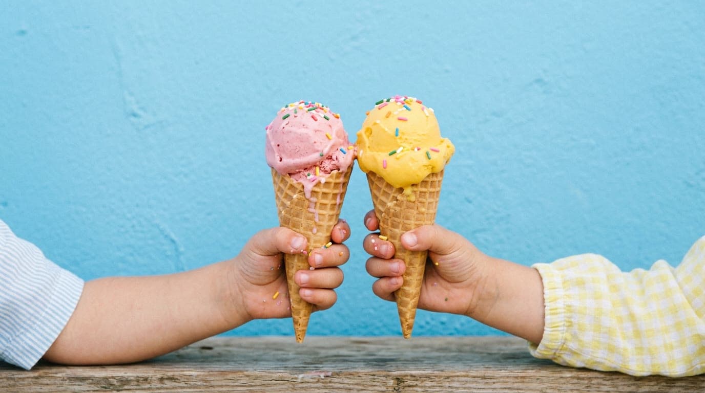 Kids holding up ice cream cones